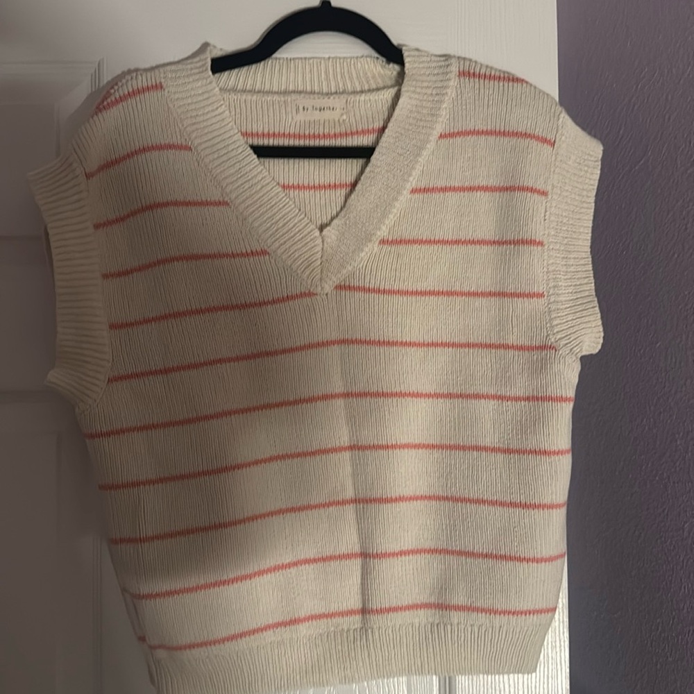 Cream white and pink stripped sweater vest. Clean and barely worn.